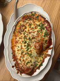 Rizzo’s House of Parm signature dishes Chicken ParmEggplant ParmThe "Rizzo" Sandwich (Chicken Parm Sandwich)
